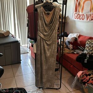 I am selling an evening gown that has never been worn,
